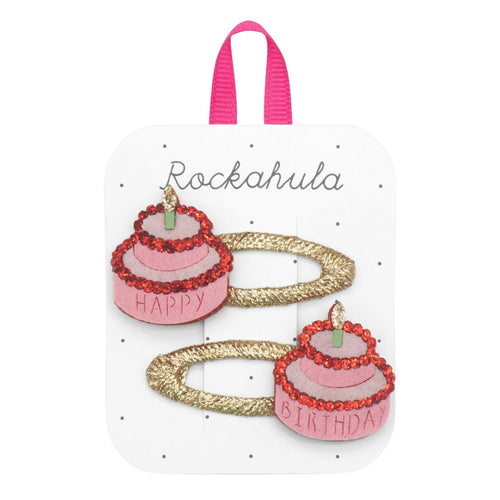 Set of hair clips with cake designs on a Rockahula branded card.