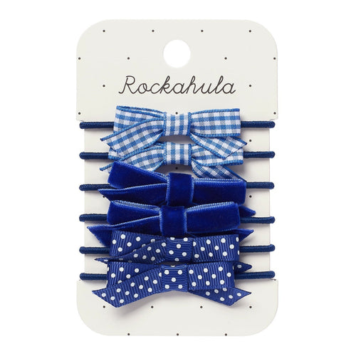 Set of blue hair bows on a Rockahula branded card