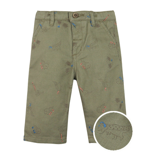 Green pants with embroidered designs on a white background