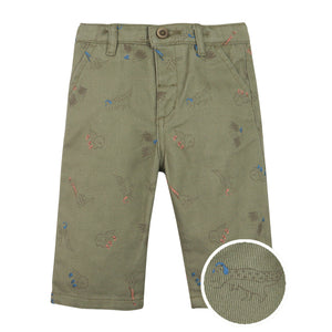 Green pants with embroidered designs on a white background