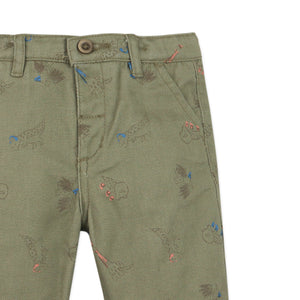 Green pants with embroidered designs on a white background