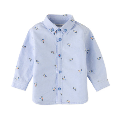 Light blue children's shirt with small patterns on a white background
