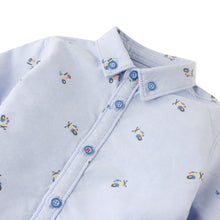 Load image into Gallery viewer, Light blue shirt with small airplane patterns on a white background