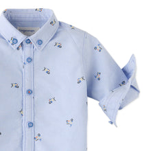 Load image into Gallery viewer, Light blue children&#39;s shirt with small patterns on a white background