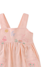 Load image into Gallery viewer, Baby Kayla apron dress by Gingersnaps featuring bunny embroidery, made of soft fabric with adjustable straps and a cute, playful design.