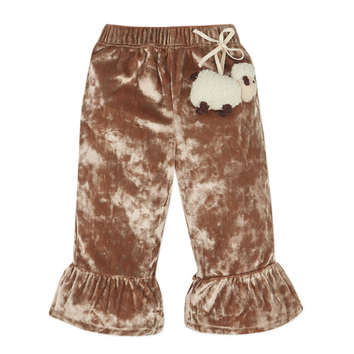 Brown velvet pants with a white sheep applique on a white background