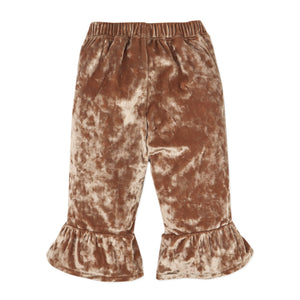 Brown velvet pants with ruffled hem on a white background