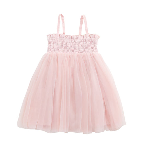 Pink dress with smocked bodice and tulle skirt on a white background