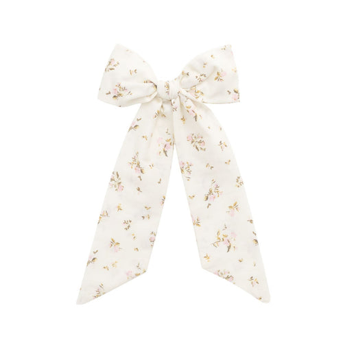 Floral scarf tied into a bow on a white background