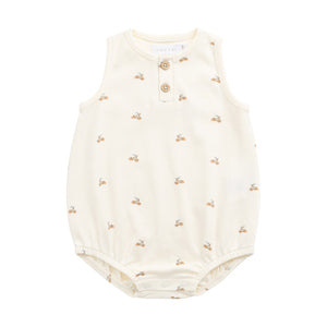 Baby romper with small patterns on a white background
