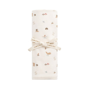White swaddle blanket with gold floral pattern on a white background