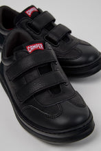 將圖片載入圖庫檢視器 A pair of black Camper toddler sneakers with two hook-and-loop straps and a red brand logo patch on the side, shown on a light gray background.