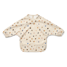 Load image into Gallery viewer, MERLE CAPE BIB - ALPHABET / SANDY
