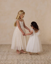 Load image into Gallery viewer, Noralee Poppy Dress Ivory displayed on a mannequin, featuring a flowy design with delicate fabric and elegant style.