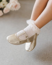 Load image into Gallery viewer, Gold metallic T-strap ballet flats from Noralee, designed for socks and tights, with a stylish T-strap and sleek finish.