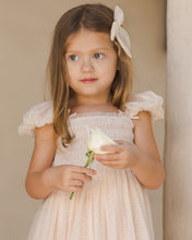 Load image into Gallery viewer, Noralee Norah Bow Pearl headband with large bow and pearl accents, styled on a model for a chic, elegant look.