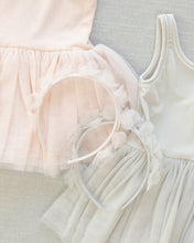 Load image into Gallery viewer, Noralee blush pixie headband with delicate design, shown styled on a flat surface in the product image.