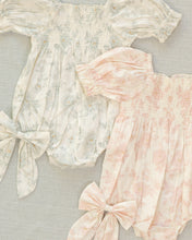 Load image into Gallery viewer, Noralee Hazel Romper Mist English Rose, lightweight floral romper with soft fabric and adjustable straps, styled with flats.