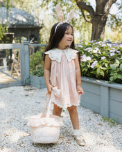 將圖片載入圖庫檢視器 Noralee Florence Dress Petal, a stylish dress featuring floral petal details, shown in a lifestyle image with a model wearing it outdoors.