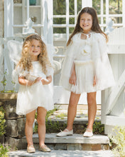 將圖片載入圖庫檢視器 Noralee Tulle Cape Confetti top shown in a lifestyle setting with delicate tulle fabric and colorful confetti details.