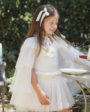 將圖片載入圖庫檢視器 Noralee Tulle Cape Confetti top shown on a model, featuring delicate tulle fabric with confetti details, stylish and lightweight.