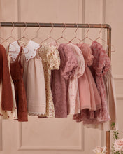 Load image into Gallery viewer, Noralee Luna Dress Bouquet, a stylish dress featuring floral design, displayed on a rack with vibrant colors and elegant fabric.