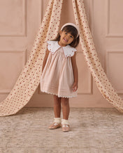 Load image into Gallery viewer, Noralee Florence Dress Petal Stripe, sleeveless summer dress with pastel floral pattern and flowing fabric on a mannequin.
