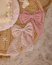 Load image into Gallery viewer, Pink Alice Bow headband by Noralee featuring a soft fabric bow on a stylish hair accessory.