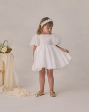 Load image into Gallery viewer, Noralee Sofia white dress displayed on a model, showcasing a stylish and elegant design perfect for casual or dressy occasions.