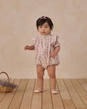 Load image into Gallery viewer, Noralee Maddie Romper in pastel garden print, lightweight fabric with floral pattern, sleeveless design, perfect for warm weather.