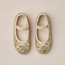 Load image into Gallery viewer, Pair of gold glittery ballet flats on a beige background