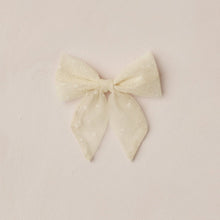 Load image into Gallery viewer, Cream-colored bow on a beige background
