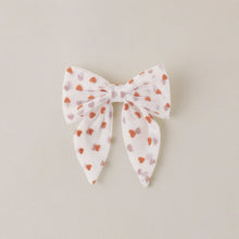 Load image into Gallery viewer, Noralee Norah Bow Red Hearts headband with large bow and playful heart pattern on ivory background, stylish accessory for girls