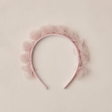 Load image into Gallery viewer, Pink headband with floral details on a beige background