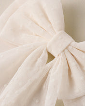 Load image into Gallery viewer, Noralee Alice Bow Ivory headband featuring a large fabric bow and elegant design for a stylish accessory.