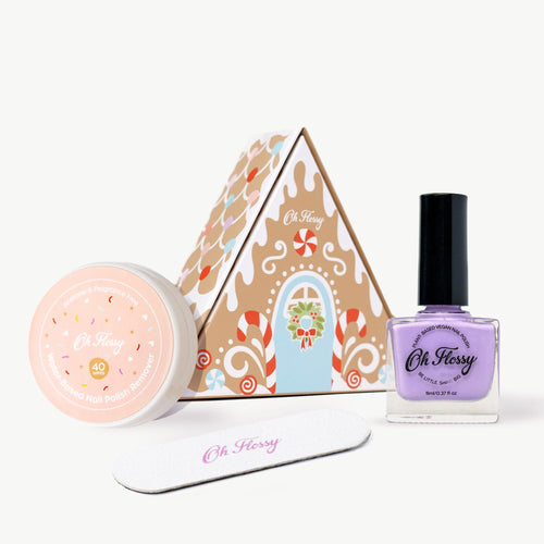 Set of Oh Flossy products including a pink jar, a bottle, and a box on a white background