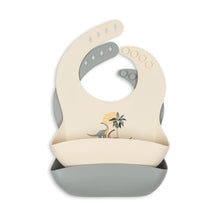 Load image into Gallery viewer, Baby bib with dinosaur design on a white background