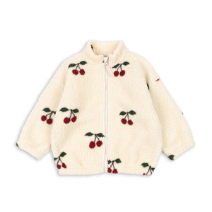 Cream-colored jacket with cherry pattern on a white background