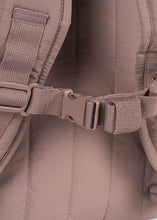 Load image into Gallery viewer, Close-up of a brown backpack with a buckle and strap