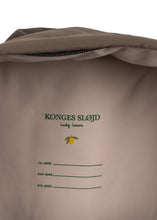 Load image into Gallery viewer, Brown jacket with &#39;Konges Sløjd&#39; logo and text on a white background