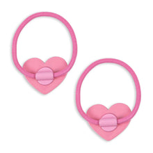 Load image into Gallery viewer, Two pink heart-shaped hair ties with a bow on a white background