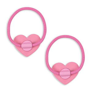 Two pink heart-shaped hair ties with a bow on a white background