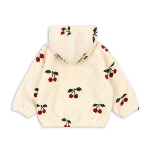 Cream-colored hoodie with cherry pattern on a white background