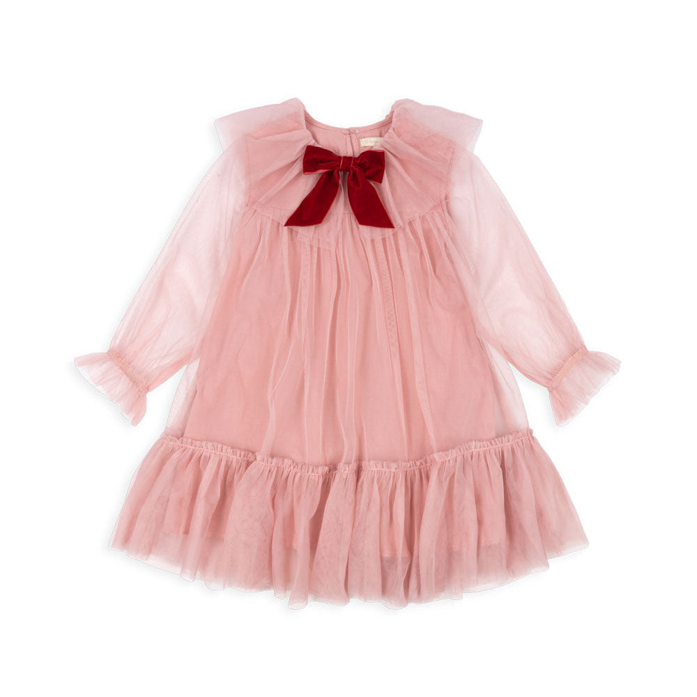 Pink dress with a red bow on a white background