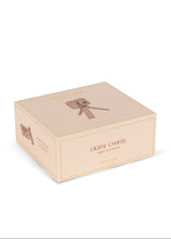 Load image into Gallery viewer, Beige box with a camera tripod icon and text on a white background