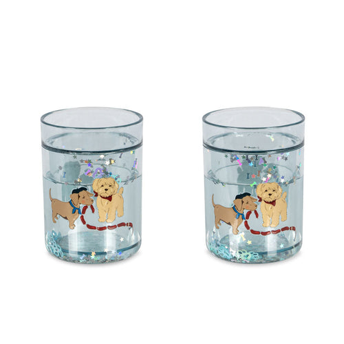 Two clear tumblers with dog illustrations on a white background
