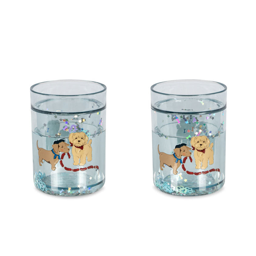 Two clear tumblers with dog illustrations on a white background