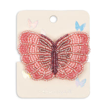 Load image into Gallery viewer, Pink butterfly hair clip on a beige card with decorative elements