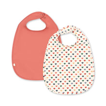 將圖片載入圖庫檢視器 Two Konges Sløjd dinner bibs in faded rose and coeur colore with soft fabric and adjustable neck straps for messy meals.