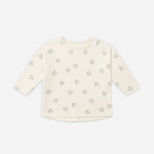Load image into Gallery viewer, Beige long-sleeve shirt with small print on a white background